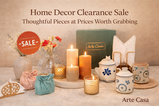 Home decor clearance sale featuring candles, vases and decorative accents at Arte Casa
