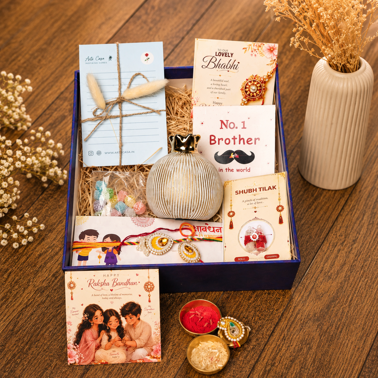Artecasa Ivory Pomegranate Rakhi Gift Hamper for Bhai Bhabhi | Premium Raksha Bandhan Gift Box