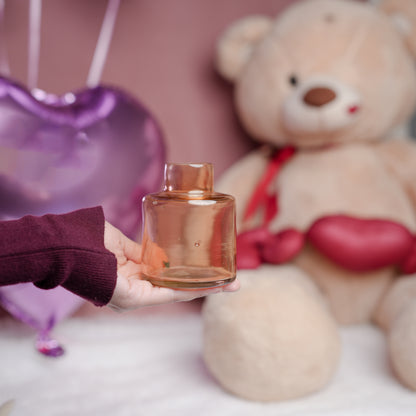 little blossom vase with dried flower bunch in mini glass vase