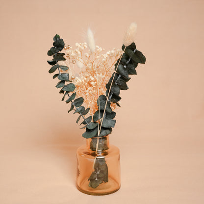 little blossom vase with dried flower bunch in mini glass vase