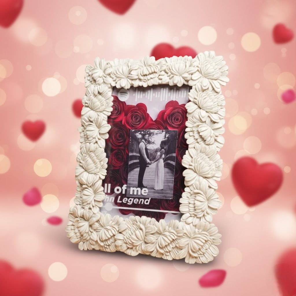 white artisan ceramic photo frame by artecasa