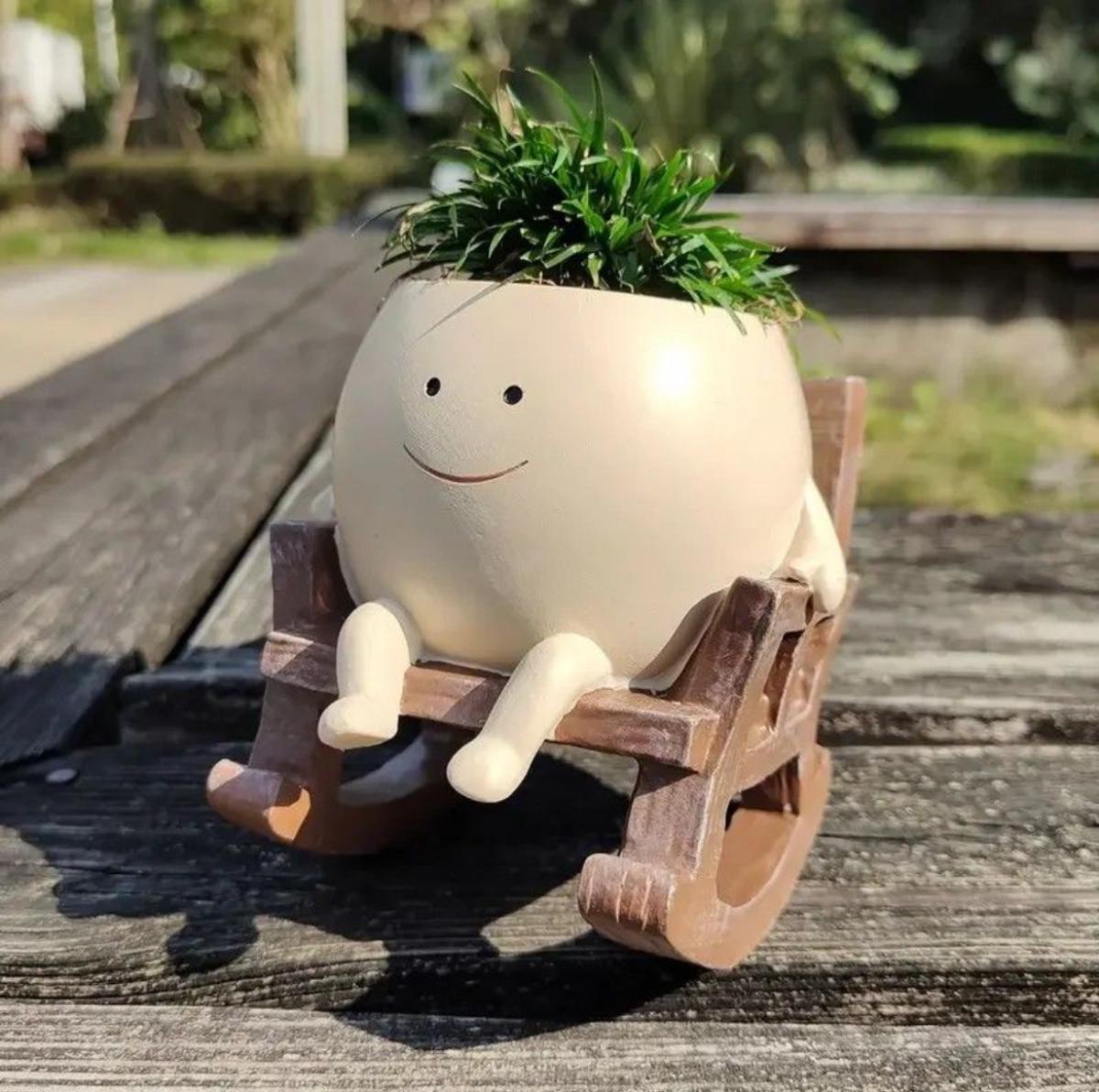 Swing planter on chair