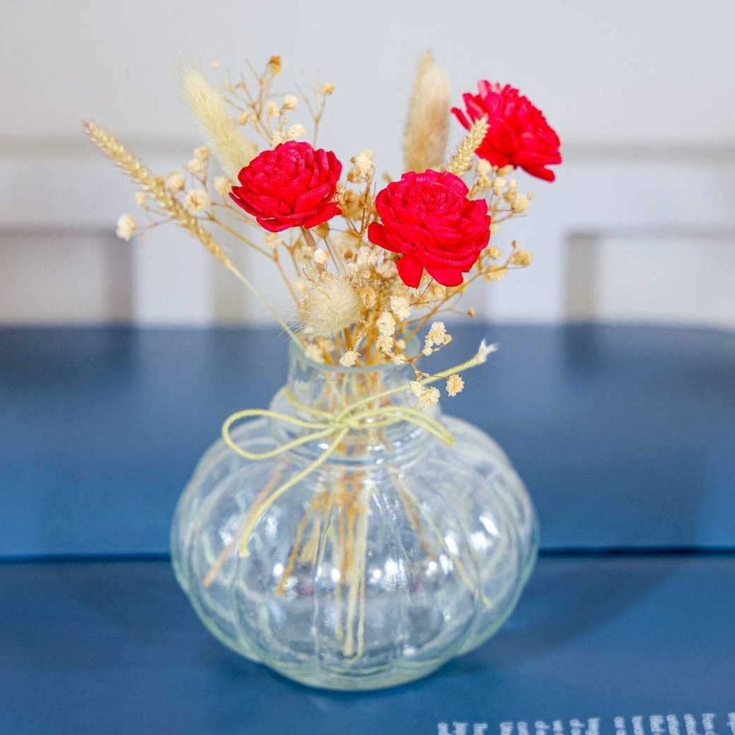 Mini glass bottle vase with red velvet bunch - https://artecasa.in/