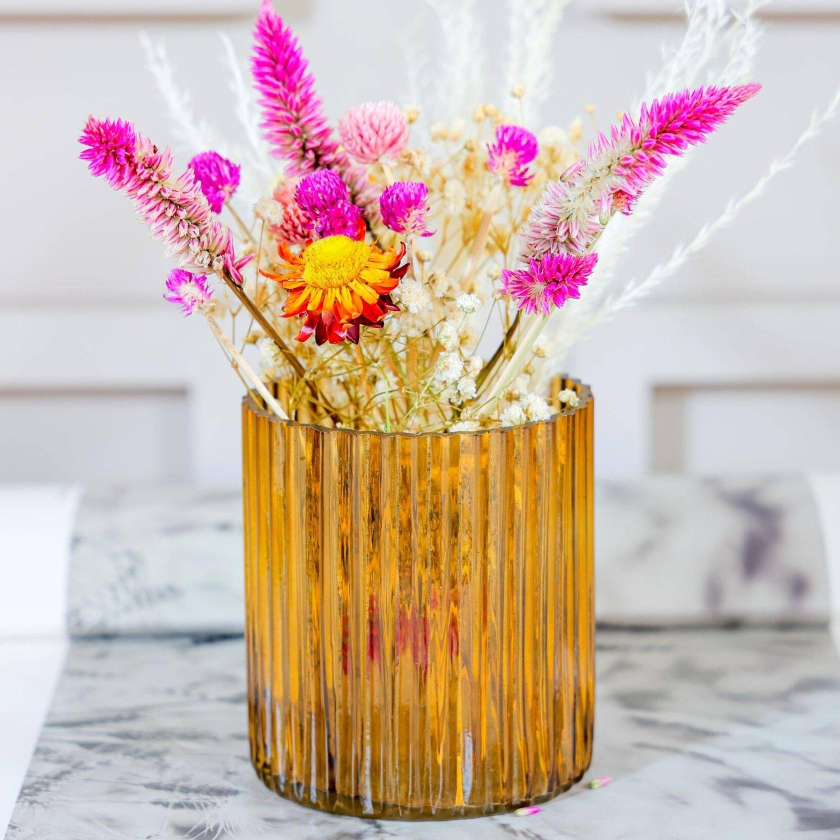 Yellow horizontal vase with Garden bunch