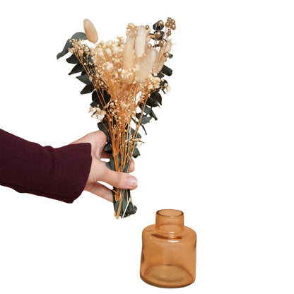 little blossom vase with dried flower bunch in mini glass vase