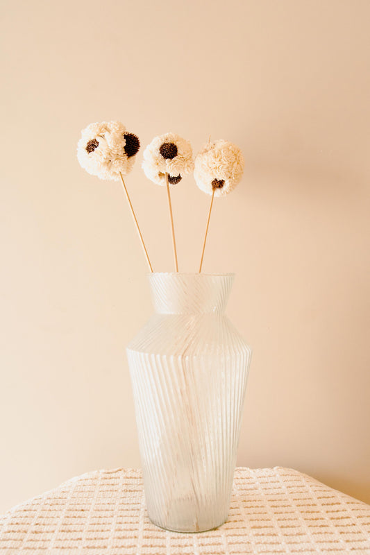 Handmade white sola flower ball sticks used for aesthetic home decor and elegant interior styling